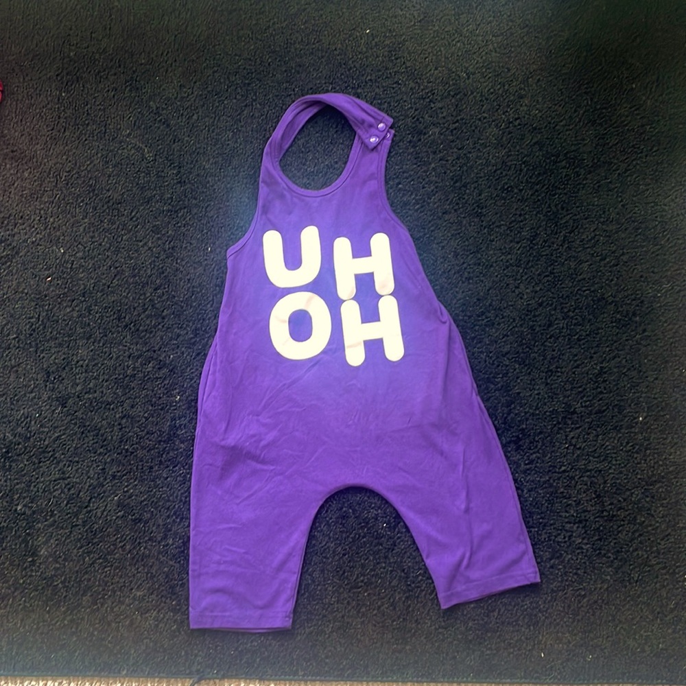 Comfy romper that says “Uh Oh”